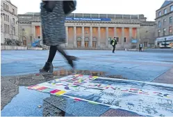  ?? Picture: Kris Miller. ?? A Dundee 2023 bid banner lying in tatters in City Square.