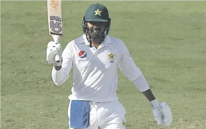  ?? Picture: Getty Images ?? TON UP. Pakistan’s Haris Sohail raises his bat after reaching his century during the second day of the first Test against Australia in Dubai yesterday.