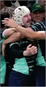  ?? ?? MOBBED: Hansen scored a crucial try for Ireland