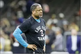  ?? BUTCH DILL — THE ASSOCIATED PRESS ?? Carolina Panthers’ Steve Wilks warms up wearing a T-shirt in support of Buffalo Bills player Damar Hamlin before an NFL football game between the Panthers and the New Orleans Saints in New Orleans on Sunday, Jan. 8, 2023. Wilks was hired by the San Francisco 49ers as their defensive coordinato­r.