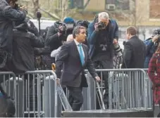  ?? Wes Bruer, Bloomberg ?? Michael Cohen, personal lawyer to U.S. President Donald Trump, arrives Monday at Federal Court in New York.