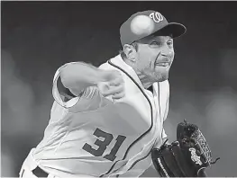  ?? AP Photo/Pablo Martinez Monsivais ?? n Washington Nationals starting pitcher Max Scherzer delivers a pitch Monday against the Miami Marlins at Nationals Park in Washington.