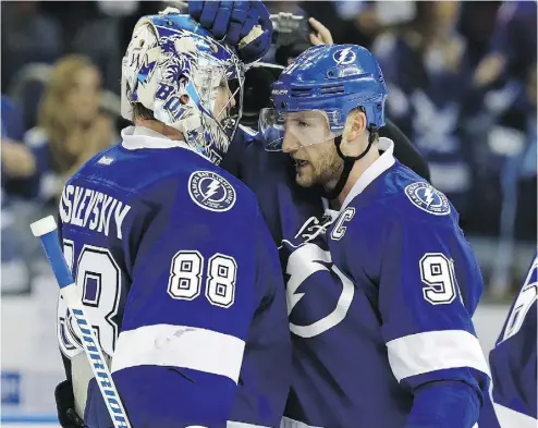  ?? MIKE CARLSON / THE ASSOCIATED PRESS ?? After general manager Steve Yzerman told the hockey world that Steven Stamkos, right, would not be traded, the Lightning star emerged from a slump to score four goals in five games and help Tampa Bay win four in a row.
