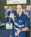  ?? PHOTO: USQ PHOTOGRAPH­Y ?? TOP DOLLAR: USQ undergradu­ates Jarrod Walker (left) and Ashley Webber promote USQ at the recent Toowoomba Open Day. USQ graduates are, on average, the highest paid in the country.