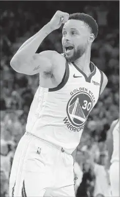  ?? BEN MARGOT/AP ?? Stephen Curry made nine 3-pointers as the Warriors cruised to a 116-94 win over the Trail Blazers in Game 1 of the Western Conference finals Tuesday.