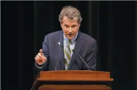  ?? GARY LANDERS — THE ASSOCIATED PRESS ?? Sen. Sherrod Brown, D-Ohio, answers a question during the U.S. Senate debate with Rep. Jim Renacci, R-Ohio, at Miami University, Friday, Oct. 26, in Oxford, Ohio.