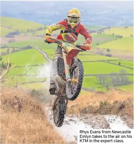  ?? ?? Rhys Evans from Newcastle Emlyn takes to the air on his KTM in the expert class.