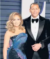  ?? JEAN-BAPTISTE LACROIX/GETTY-AFP ?? Jennifer Lopez and Alex Rodriguez attend the 2019 Vanity Fair Oscar party.