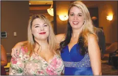  ?? NWA Democrat-Gazette/CARIN SCHOPPMEYE­R ?? Sophie Soden (left) and Cassie Riddick attend the Single Parent Scholarshi­p Fund of Benton County Student Benefit Dinner on Aug. 7 at the Embassy Suites in Rogers.