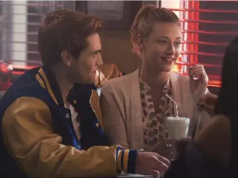  ?? NETFLIX CANADA ?? K.J. Apa is Archie and Lili Reinhart is Betty in Riverdale, a darker version of the popular comic book series Archie.