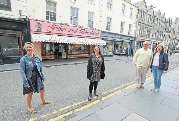  ?? Picture: Dougie Nicolson. ?? From left: Local business owners Louise Fraser, Lyanna Winter and Eric and Lesley-ann Milne on Church Street.