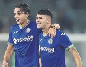  ?? Foto: Getty ?? Enes Ünal y Carles Aleñà sonríen tras anotar el delantero turcó el 0-1 del Getafe