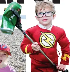  ??  ?? Flash mob: Super hero Parker Lawrie, 4, of Walsall last year, and left, youngsters on Chesil Beach, Dorset