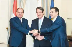  ??  ?? President Abdel Fattah Al-Sisi with his Cypriot counterpar­t and Greek PM