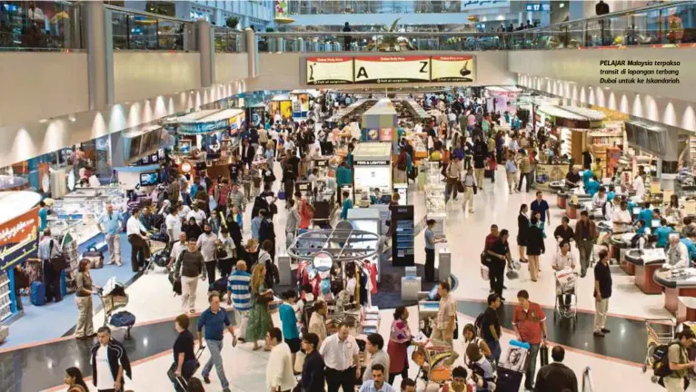  ??  ?? PELAJAR Malaysia terpaksa transit di lapangan terbang Dubai untuk ke Iskandaria­h.