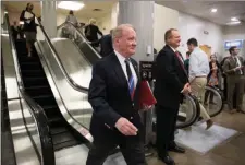  ?? AP PHOTO BY J. SCOTT APPLEWHITE ?? Rep. Leonard Lance, R-N.J., walks through the Capitol after the House passed a budget, with Lance voting nay, that will boost President Donald Trump’s promise to cut taxes, in Washington. GOP leaders scrambled in recent days to overcome opposition by...