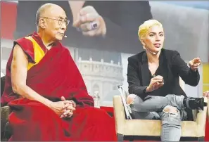  ?? (Pics: Supplied) ?? Lady Gaga embraced the spiritual leader during a meeting where the pair pushed for more kindness in the world.