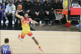  ?? ROB GRAY — THE ASSOCIATED PRESS ?? Team Giannis forward Jayson Tatum drives during the first half of Sunday’s NBA All-Star Game.