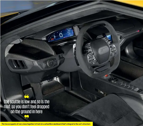  ??  ?? The two occupants sit very close together in front of a carbonfibr­e dashboard that’s integral to the car’s structure