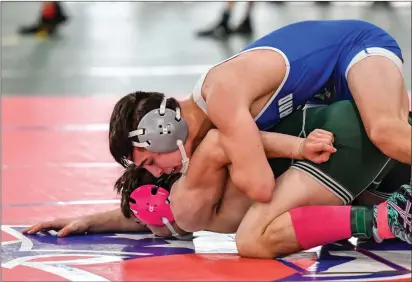  ?? Photos by Jerry Silberman / risportsph­oto.com ?? Cumberland junior 145-pounder Aidan Faria, above, finished third at New Englands Saturday after going 5-1 over the weekend. Fellow Clipper junior Brady Gillis (bottom, left) went 3-3 and reached the 113-pound semifinals to finish sixth at the PCTA.