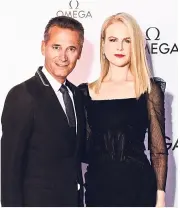  ??  ?? Omega President Aeschliman­n with Kidman at the exhibition.