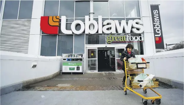  ?? NATHAN DENETTE / THE CANADIAN PRESS FILES ?? “We will certainly be ready (for a price war) if the marketplac­e heats up,” Loblaw executive chairman Galen Weston said.