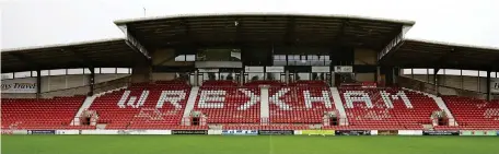  ??  ?? Hard times: Wrexham AFC were relegated from the Football League in 2008 and taken over by fans in 2011
