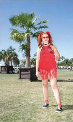  ?? AFP photos ?? Genevieve Paish of Christchur­ch, New Zealand, poses at the Coachella Music and Arts Festival in Indio, California.—