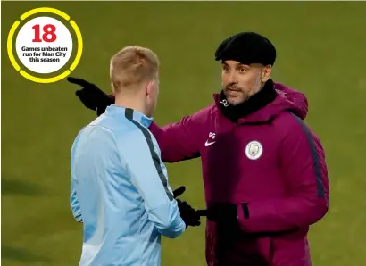  ?? — Reuters ?? Manchester City star Kevin De Bruyne and manager Pep Guardiola during a training session on Monday.