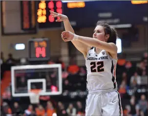  ?? PHOTO COURTESY OF OREGON STATE/SCOBEL WIGGINS ?? Oregon State guard Kat Tudor, a Woodbridge native and St. Mary's graduate, watches a shot in January of 2018. Tudor, a 3-point sharpshoot­er, tore her ACL part way through the 2018-19 season.