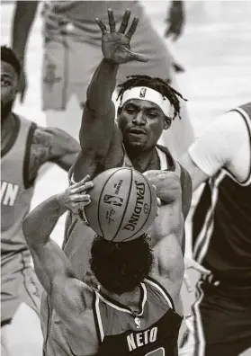  ?? Yi-Chin Lee / Staff photograph­er ?? Despite being without key contributo­rs like Danuel House Jr., above, the Rockets have been markedly better on defense since the trade of James Harden.