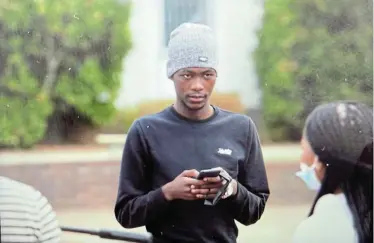  ?? Picture: ESA ALEXANDER ?? TRAUMATIC EVENT: Stellenbos­ch University first-year student Babalo Ndwayana arrives at the Western Cape town's police station to lay a complaint yesterday