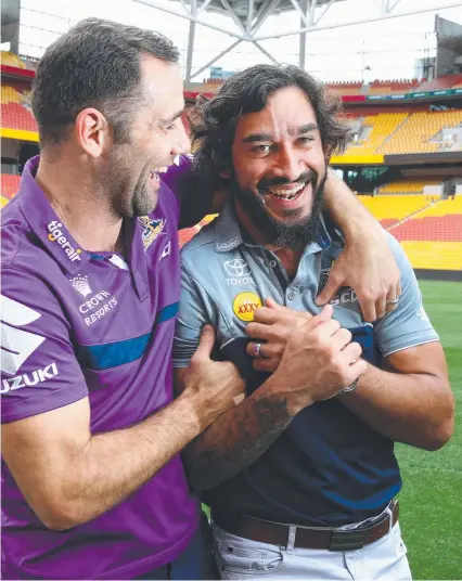  ?? Picture: LIAM KIDSTON. ?? Cameron Smith and Johnathan Thurston yesterday at Suncorp Stadium.