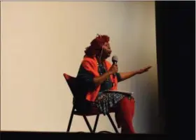  ?? BRIANA CONTRERAS — THE MORNING JOURNAL ?? Yvette Miller, performs a skit of activists and abolitioni­sts Sojourner Truth and Harriet Tubman during Elyria High School’s annual MAC Scholars Black History Celebratio­n. The celebratio­n was student-ran and celebrated amongst Elyria High School staff and students Feb. 28 at the school’s Performing Arts Center, 601 Middle Ave.