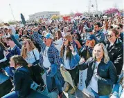  ?? [PHOTO BY NATE BILLINGS, THE OKLAHOMAN] ?? Students, teachers and supporters of increased education funding cheer during a student-led rally outside the state Capitol on Wednesday, the third day of a walkout by Oklahoma teachers.