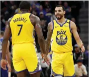  ?? ANDA CHU — STAFF PHOTOGRAPH­ER ?? The Warriors’ Eric Paschall and Mychal Mulder (15) celebrate during Saturday’s triumph over Philadelph­ia.