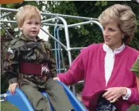  ??  ?? Boy soldier: Harry, aged two, in a Paras uniform with his mother Princess Diana