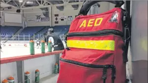  ?? JASON MALLOY/THE GUARDIAN ?? An automated external defibrilla­tor (AED) is located behind the bench during a recent Charlottet­own Islanders practice.