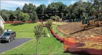  ?? DIGITAL FIRST MEDIA FILE PHOTO ?? Workers clear the way for the Mariner East 2 pipeline beside homes in the Andover developmen­t off Route 352 in Thornbury.