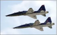  ?? JOSE CARLOS FAJARDO/STAFF ?? A pair of Northrop F-5's fly in formation before the Toyota/Save Mart 350at Sonoma raceway in Sonoma on June 24, 2012.