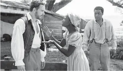  ?? MCCLATCHY-TRIBUNE ?? Do people today largely understand slavery as it’s depicted in films like “12 Years a Slave”? The 2013 film garnered three Academy Awards, including a Best Supporting Actress Oscar for Lupita Nyong'o, center.