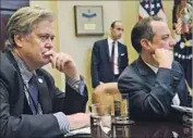  ?? Brendan Smialowski AFP/Getty Images ?? IN THE West Wing, Stephen K. Bannon, left, and Stephen Miller, center, have pushed an ominous view of refugee and immigratio­n f lows, a Trump aide said.