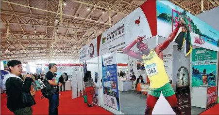  ?? CHEN XIAOGEN / FOR CHINA DAILY ?? Jamaica’s tourist attraction­s are displayed at an internatio­nal tourism exhibition in Beijing in 2019.