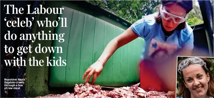  ??  ?? Repulsive: Kezia Dugdale crawls through a box of raw meat