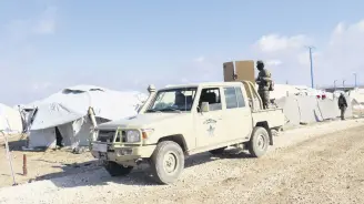  ?? ?? YPG members patrol in Hassakeh, Syria, Jan. 27, 2024.