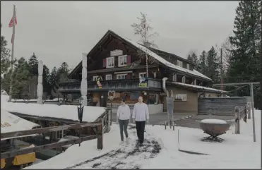  ?? ?? Julia and Silvan Betschart are pictured at Herrenbode­n, their rustic lodge in Sattel, Switzerlan­d, which they turned into a year- round destinatio­n, catering to hikers in warmer months.