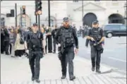  ?? REUTERS ?? Armed police officers on a patrol Westminste­r in London.