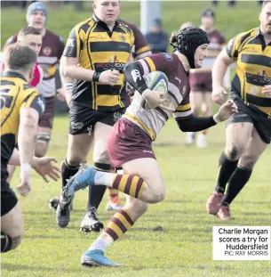  ??  ?? Charlie Morgan scores a try for Huddersfie­ld PIC: RAY MORRIS