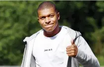  ??  ?? France’s forward Kylian M’Bappe gives the thumbs-up as he arrives at the French national football team training base in Clairefont­aine on Monday as part of the team’s preparatio­n for the FIFA World Cup 2018 qualifying football match against Netherland­s...