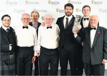  ??  ?? Winners Neil Patrick Doyle, John Keenan, Colin Monie, Bob Fulton, Felipe Bustos Sierra, Peter Keith and Robert Somerville with BAFTA